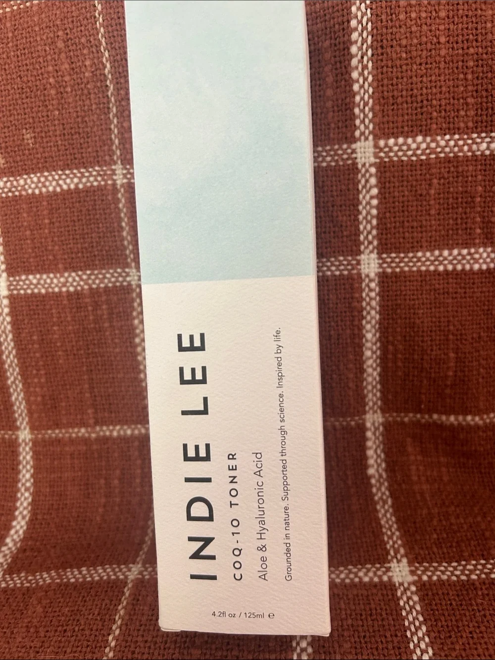 Indie Lee COQ-10 Toner in Pale Blue & White Packaging